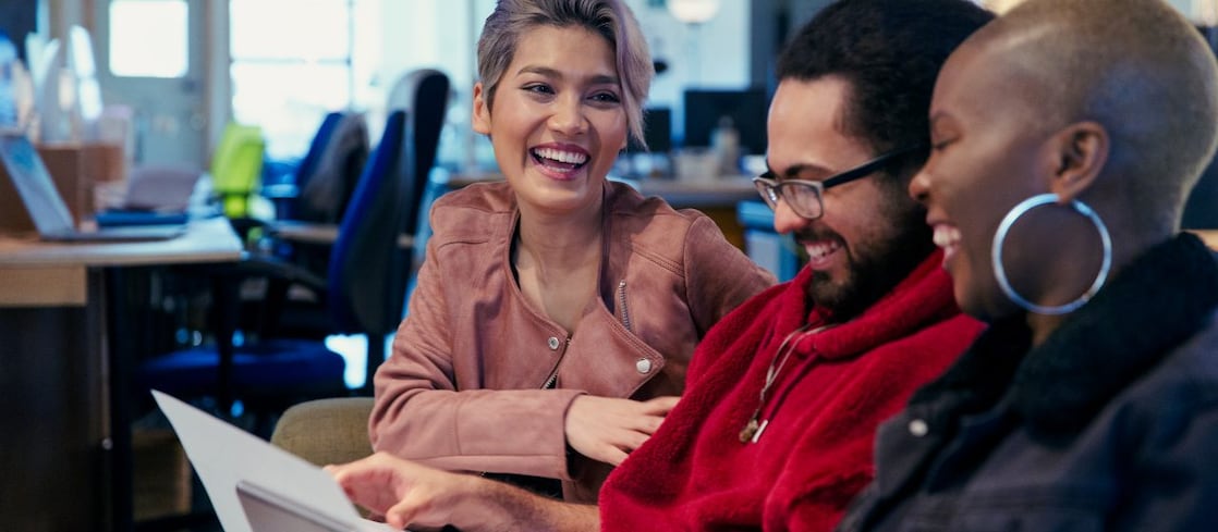Employees using computers in an office