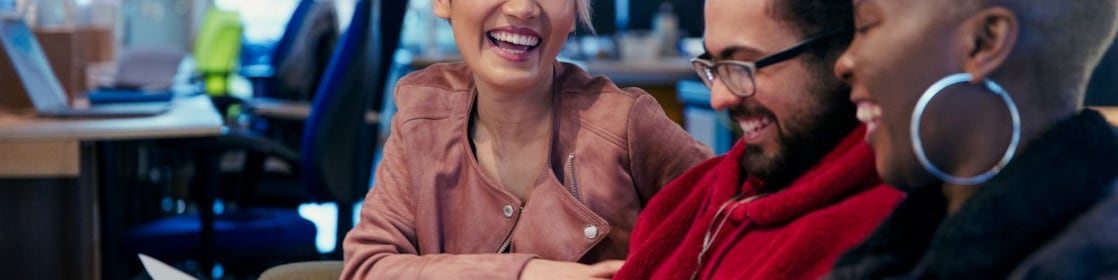 Employees using computers in an office