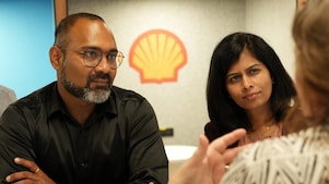 Engineer looking up at platform under construction