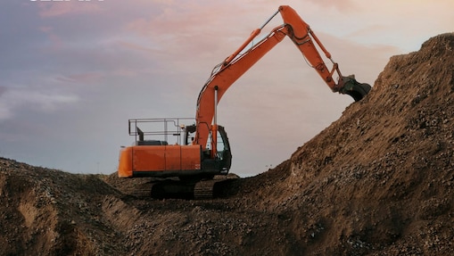 Orange digger on a construction site