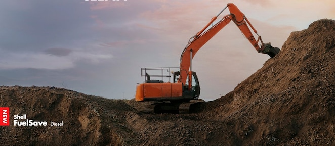 Orange digger on a construction site