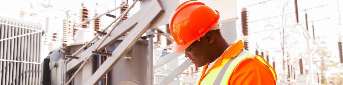 Man carrying out safety checks at a fuel distribution site in South Africa