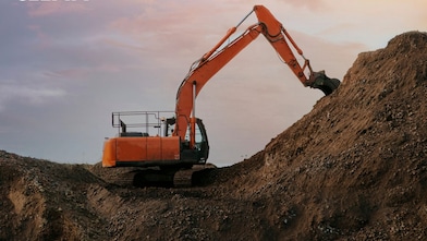 Orange digger on a construction site