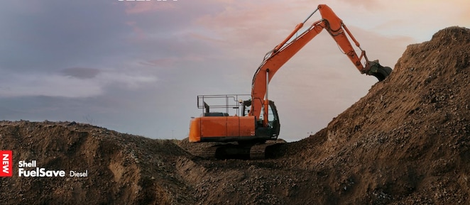 Orange digger on a construction site