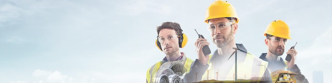 three workers on radios and reading documents, transposed over a background of blue sky with light clouds