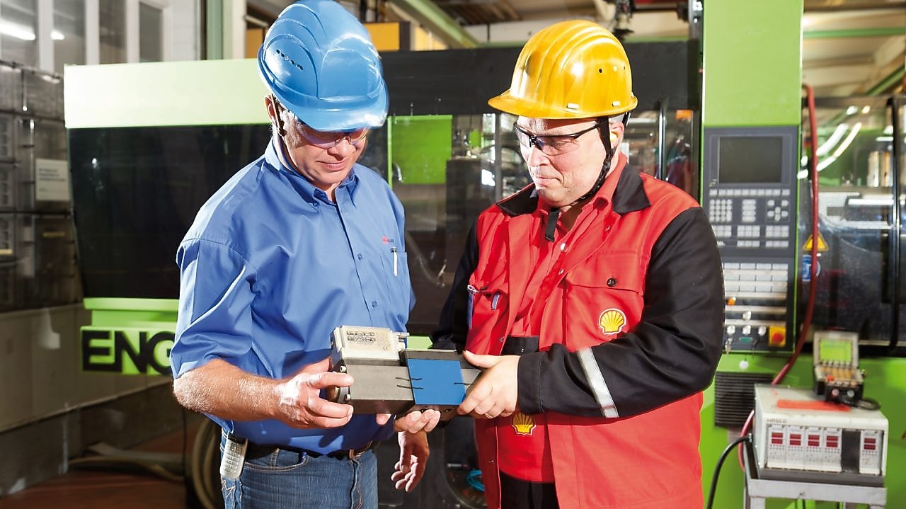 Workers talking on site