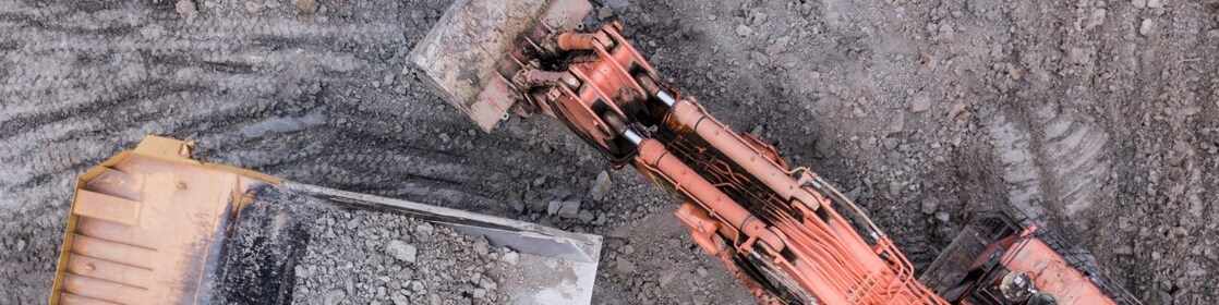 Mining Excavator and Articulated Dump Truck
