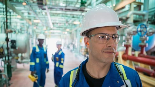 Workers at work in a power plant