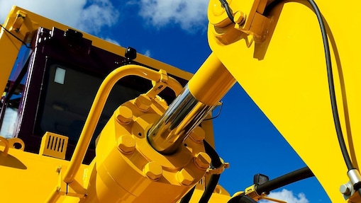 Close up on the hydraulic system of an excavator