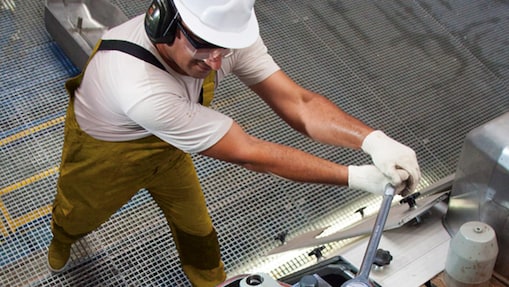 Engine operator working on equipment
