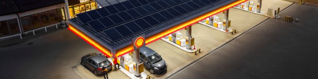 Shell Retail white car outside Petrol pump
