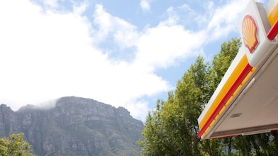 Shell retail station with mountain in background