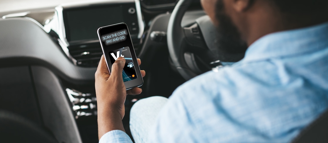 man with a phone in car