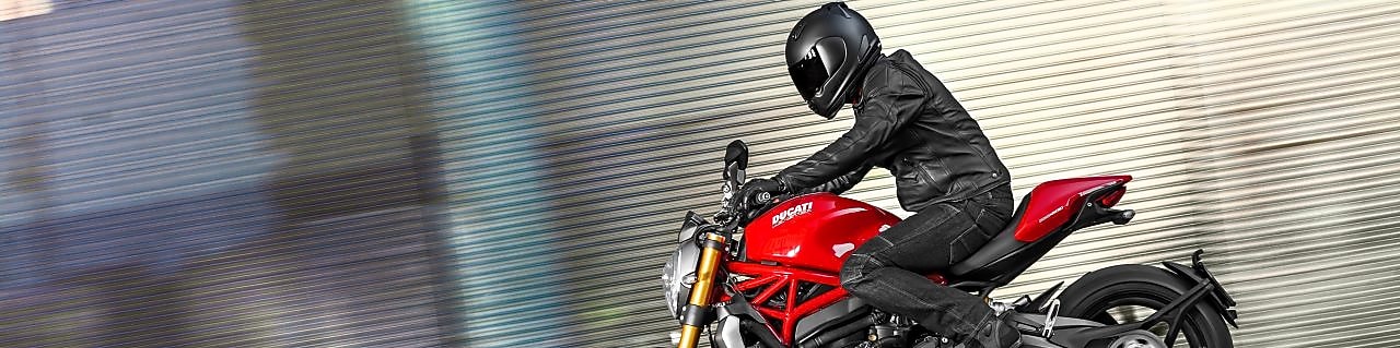 Man riding a bike which is using the Superior Engine Oil For Bikes