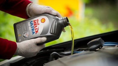 A red Maserati speeds uphill in the Shell Helix Ultra film We Know Why You Drive